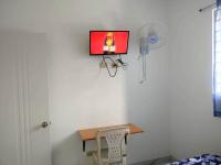 TV a/nebo společenská místnost v ubytování Apartamento amueblado en Santiago, Res Blue Amber, 2 habitaciones