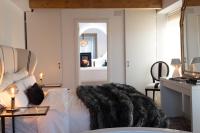 A bed or beds in a room at Casa Pepin