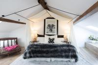 A bed or beds in a room at Casa Pepin