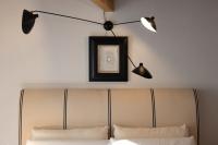 A bed or beds in a room at Casa Pepin