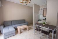 A kitchen or kitchenette at Vasileiou Apartments