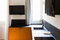 Televízia a/alebo spoločenská miestnosť v ubytovaní JOIVY Smart 1-bed with modern amenities