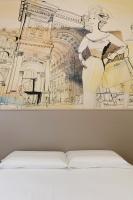 Posteľ alebo postele v izbe v ubytovaní JOIVY Smart 1-bed with modern amenities