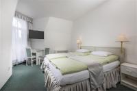Postel nebo postele na pokoji v ubytování Hotel Ferdinand