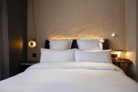 A bed or beds in a room at Letoh Letoh Gran Vía