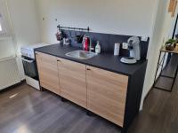Kuchyňa alebo kuchynka v ubytovaní Bel appartement 2 chambres ,résidence privée