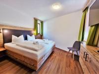 Posteľ alebo postele v izbe v ubytovaní Ferienhaus Berghof