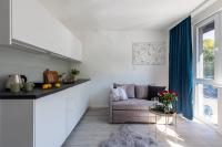 Posezení v ubytování Batorego 220 - 450m stacja metra Pola Mokotowskie, 800m Biblioteka Narodowa - 20m piękny park Pola Mokotowskie - 800m do SGH - Wifi - Smart TV - Good Apartments