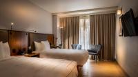 Ein Bett oder Betten in einem Zimmer der Unterkunft La Quinta by Wyndham Time Square South