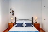 Postel nebo postele na pokoji v ubytování Cycladic Aura - Traditional Holiday Cottage