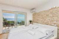 Posteľ alebo postele v izbe v ubytovaní Luxury villa with a swimming pool Icici, Opatija - 17959
