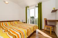 Posteľ alebo postele v izbe v ubytovaní Family friendly seaside apartments Dingac - Borak, Peljesac - 18060