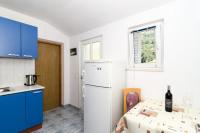 Kuchyňa alebo kuchynka v ubytovaní Family friendly seaside apartments Dingac - Borak, Peljesac - 18060