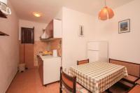 Kuchyňa alebo kuchynka v ubytovaní Family friendly seaside apartments Dingac - Borak, Peljesac - 18065