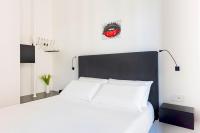 Posteľ alebo postele v izbe v ubytovaní Fiorentini Residence MILANO