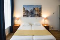 Een bed of bedden in een kamer bij Hotel Residence Le Coin