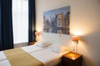 Een bed of bedden in een kamer bij Hotel Residence Le Coin