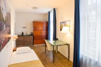 Een bed of bedden in een kamer bij Hotel Residence Le Coin