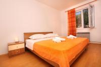 Postel nebo postele na pokoji v ubytování Apartments Marin
