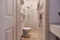 A bathroom at Dembi at the Great City Park