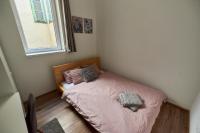 A bed or beds in a room at Dembi at the Great City Park