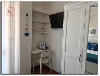 Televízia a/alebo spoločenská miestnosť v ubytovaní Casa Felicidad Alguer