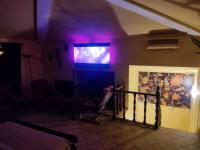 TV a/nebo společenská místnost v ubytování The Magic House