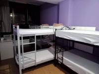 The Purple Tree Hostelにあるベッド