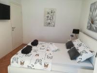 Posteľ alebo postele v izbe v ubytovaní APARTMAN D&D***