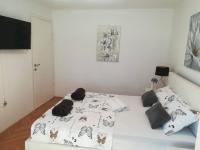 Posteľ alebo postele v izbe v ubytovaní APARTMAN D&D***