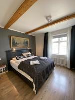 Postel nebo postele na pokoji v ubytování Old Town Luxury Apartment Akureyri