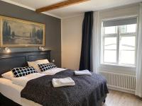 Postel nebo postele na pokoji v ubytování Old Town Luxury Apartment Akureyri