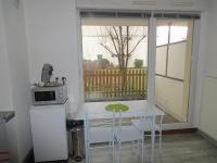 Kuchnia lub aneks kuchenny w obiekcie Logement type studio 1 piece proche zénith