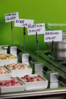 a display of different types of food on a table at Hotel Jellentrup in Münster