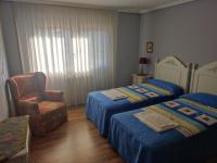 A bed or beds in a room at Fuenteazul