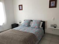 Půdorys ubytování Joli appartement récent tout confort parking privé