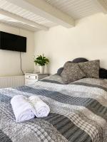 Postel nebo postele na pokoji v ubytování Sunbjerre B&B