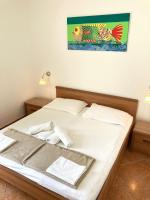 Posteľ alebo postele v izbe v ubytovaní Rooms Vinka Tudor