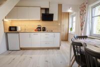 Kuchyň nebo kuchyňský kout v ubytování Apartament Petunia