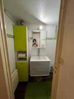Een badkamer bij Appartement dans une maison proche de Paris et Disneyland