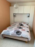 Postel nebo postele na pokoji v ubytování Appartement grande terrasse Climatisé
