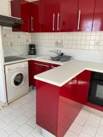 Kuchyň nebo kuchyňský kout v ubytování Appartement grande terrasse Climatisé