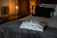 Villa Plagniau tesisinde bir odada yatak veya yataklar
