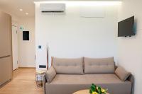 Televízia a/alebo spoločenská miestnosť v ubytovaní The First Key Luxury & small apartment in the center of Xanthi