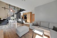 Ein Sitzbereich in der Unterkunft Waterlane Riverside - SPA, Pool, Gym &amp; Parking by Downtown Apartments