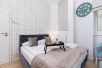 Posteľ alebo postele v izbe v ubytovaní Beautiful Apartments Kraków Dietla by Noclegi Renters