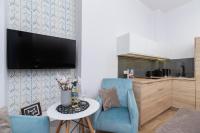Kuchyňa alebo kuchynka v ubytovaní Beautiful Apartments Kraków Dietla by Noclegi Renters