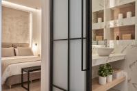Posteľ alebo postele v izbe v ubytovaní Charitos Heights Boutique Apt II, Kolonaki