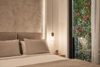 Posteľ alebo postele v izbe v ubytovaní Charitos Heights Boutique Apt II, Kolonaki