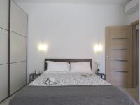 Posteľ alebo postele v izbe v ubytovaní Pasubio Apartment